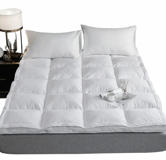 Una nueva opción para dormir en el invierno frío: ¿es el topper del colchón de hotel de la cama de plumas de doble capa realmente más cómoda que una manta eléctrica?
